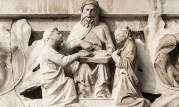 Moses teach Israelites the Law of God, ancient medieval relief on Venice Doge Palace column